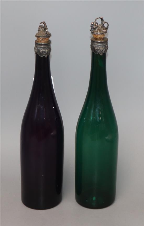 A Regency amethyst decanter and a green glass decanters